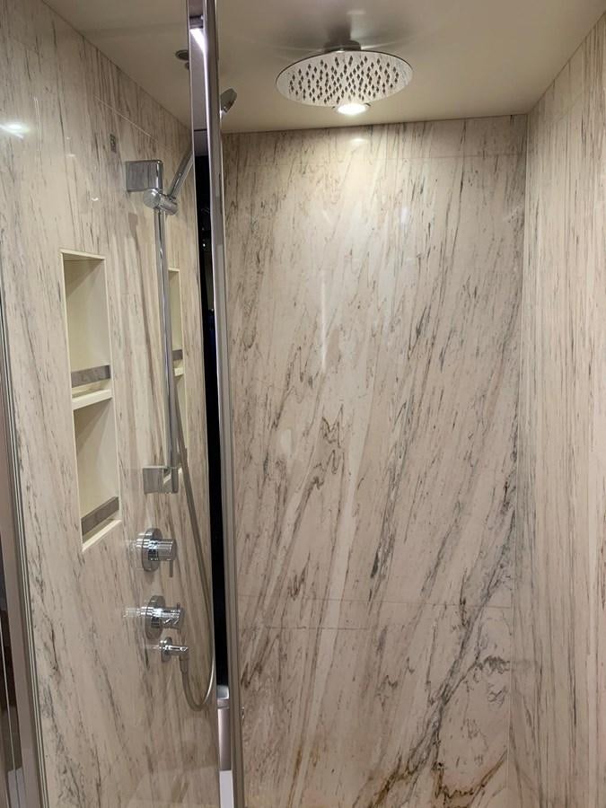 a shower with a mirror aboard AMALFI Yacht for Sale