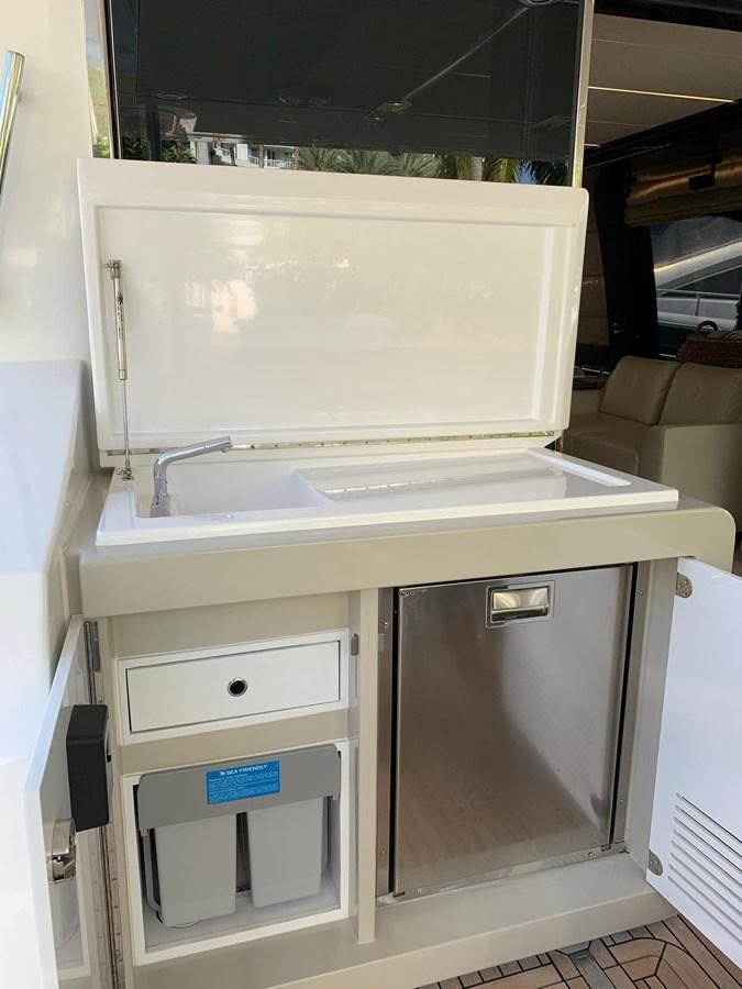 a white refrigerator with drawers aboard AMALFI Yacht for Sale