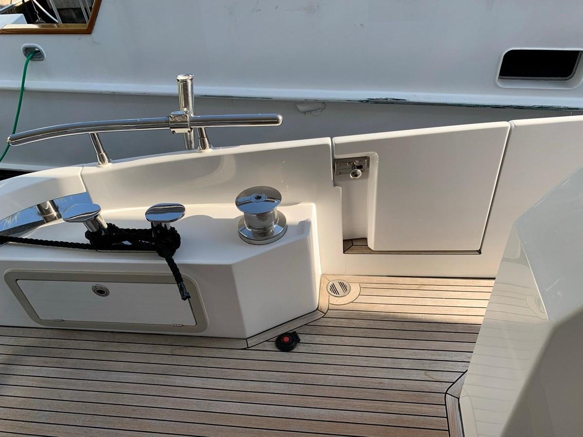 a white machine with a metal handle aboard AMALFI Yacht for Sale
