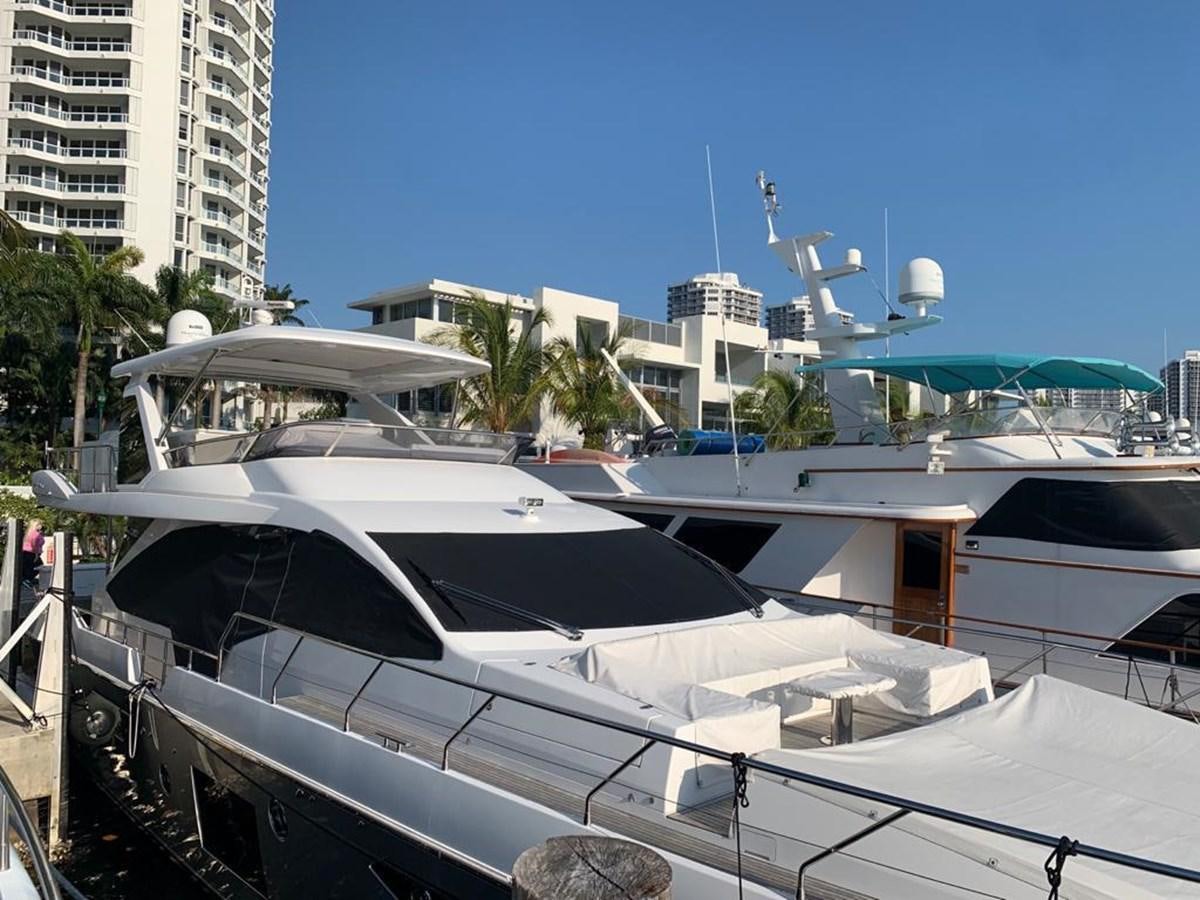 a yacht docked at a pier aboard AMALFI Yacht for Sale