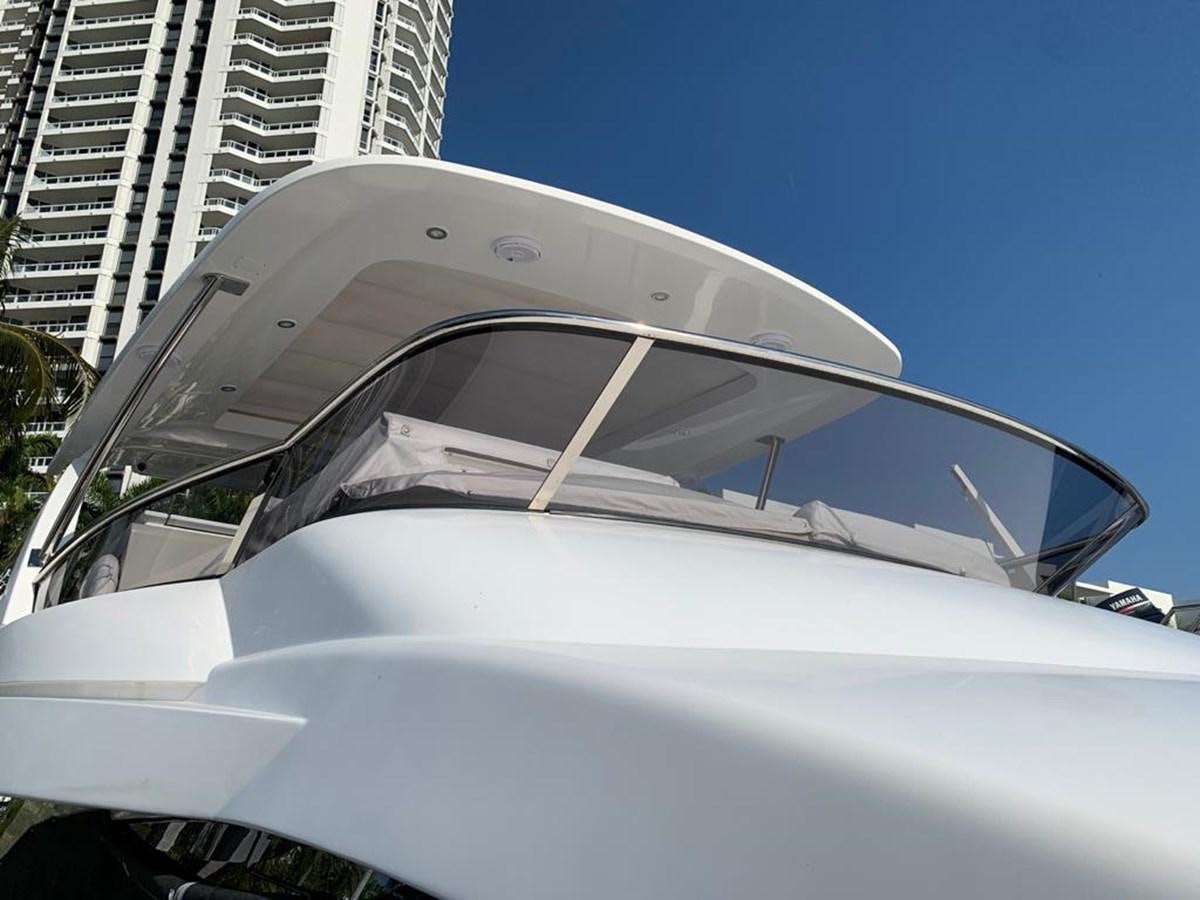 a white car with a large windshield aboard AMALFI Yacht for Sale
