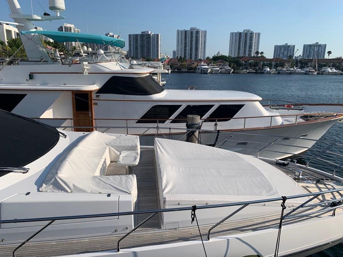 a boat docked at a pier aboard AMALFI Yacht for Sale