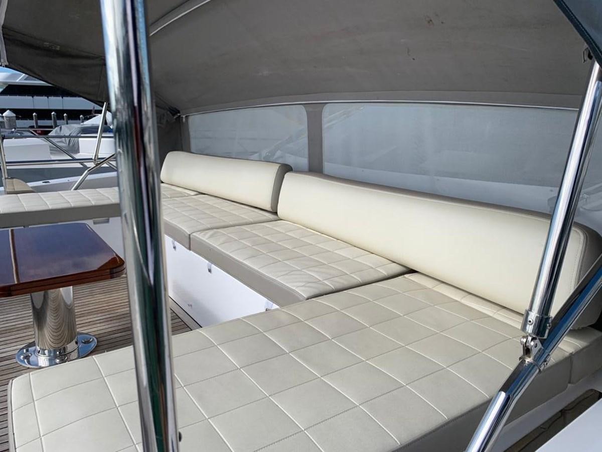 a room with a glass door and a window aboard AMALFI Yacht for Sale