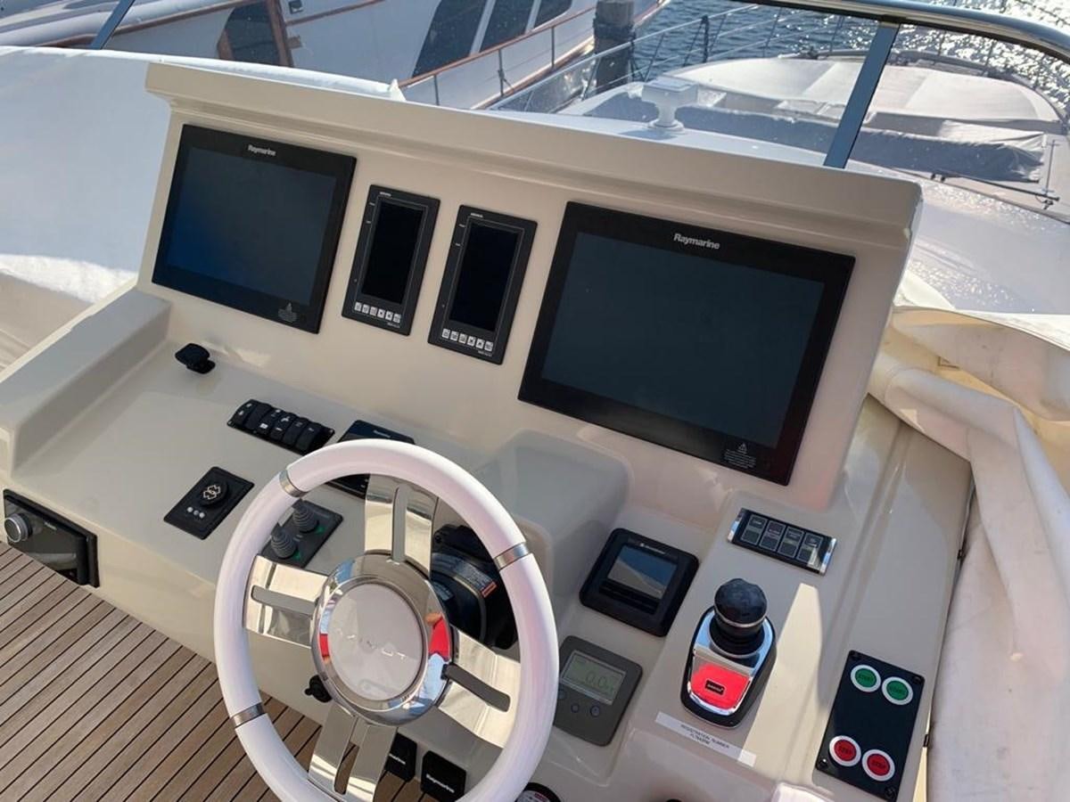 a computer tower with a large screen aboard AMALFI Yacht for Sale