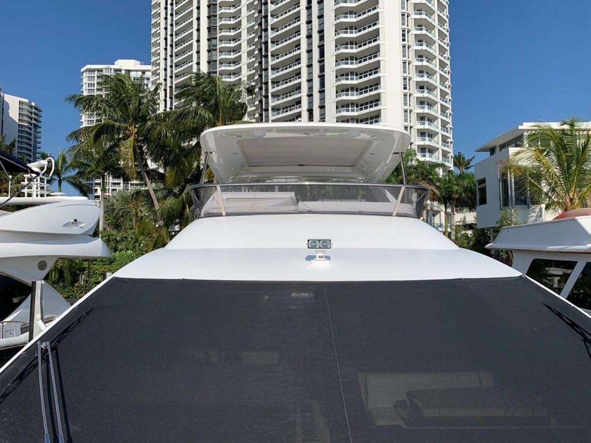 a white boat on a deck aboard AMALFI Yacht for Sale