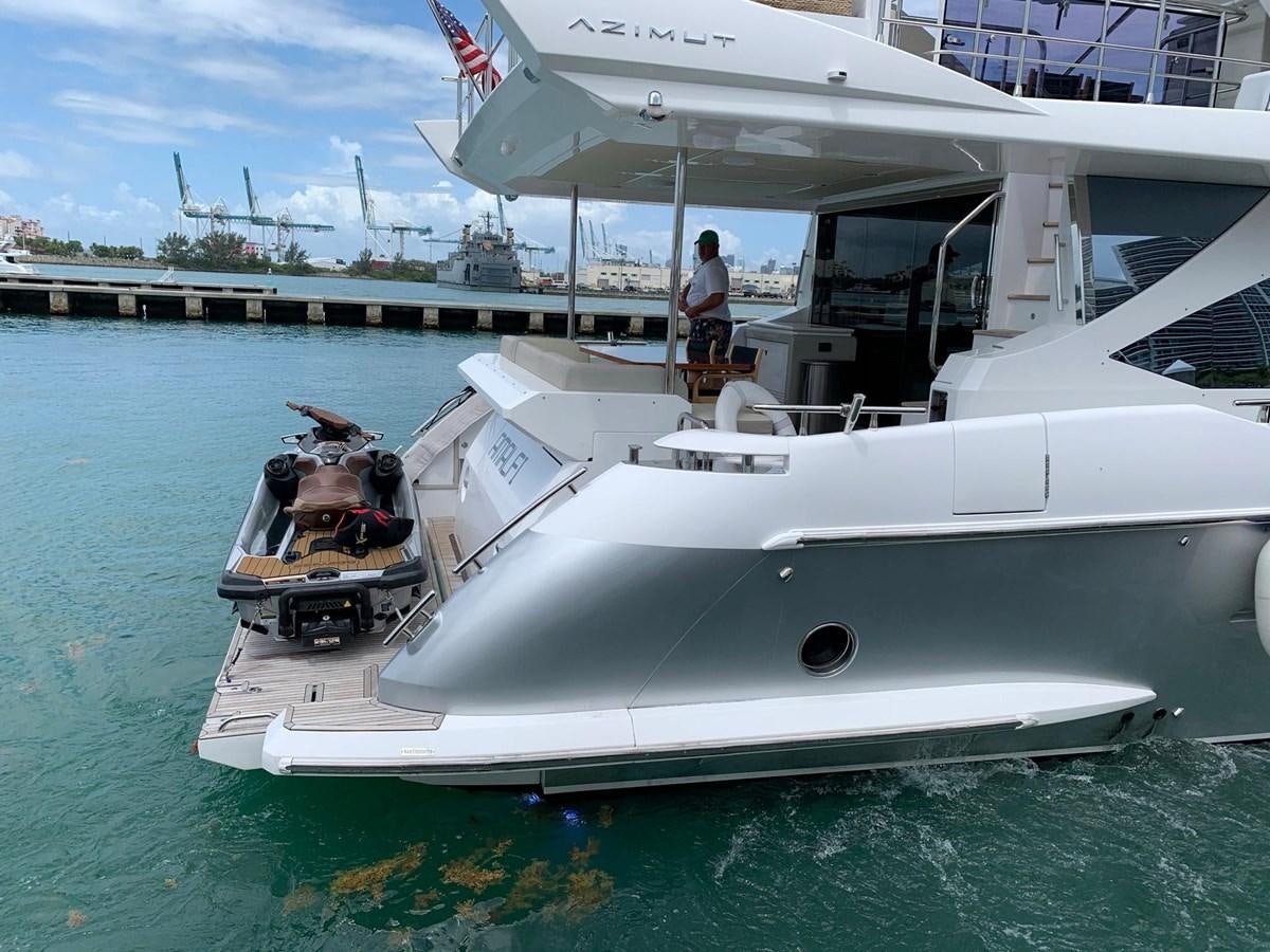 a boat with a person standing on the deck aboard AMALFI Yacht for Sale