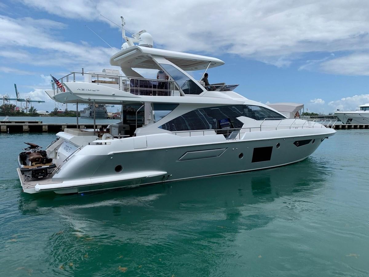 a white yacht in the water aboard AMALFI Yacht for Sale