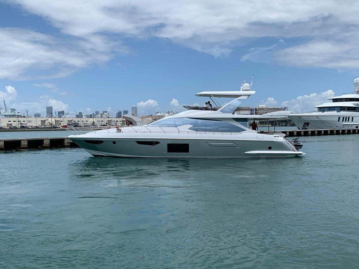 a white yacht in the water aboard AMALFI Yacht for Sale
