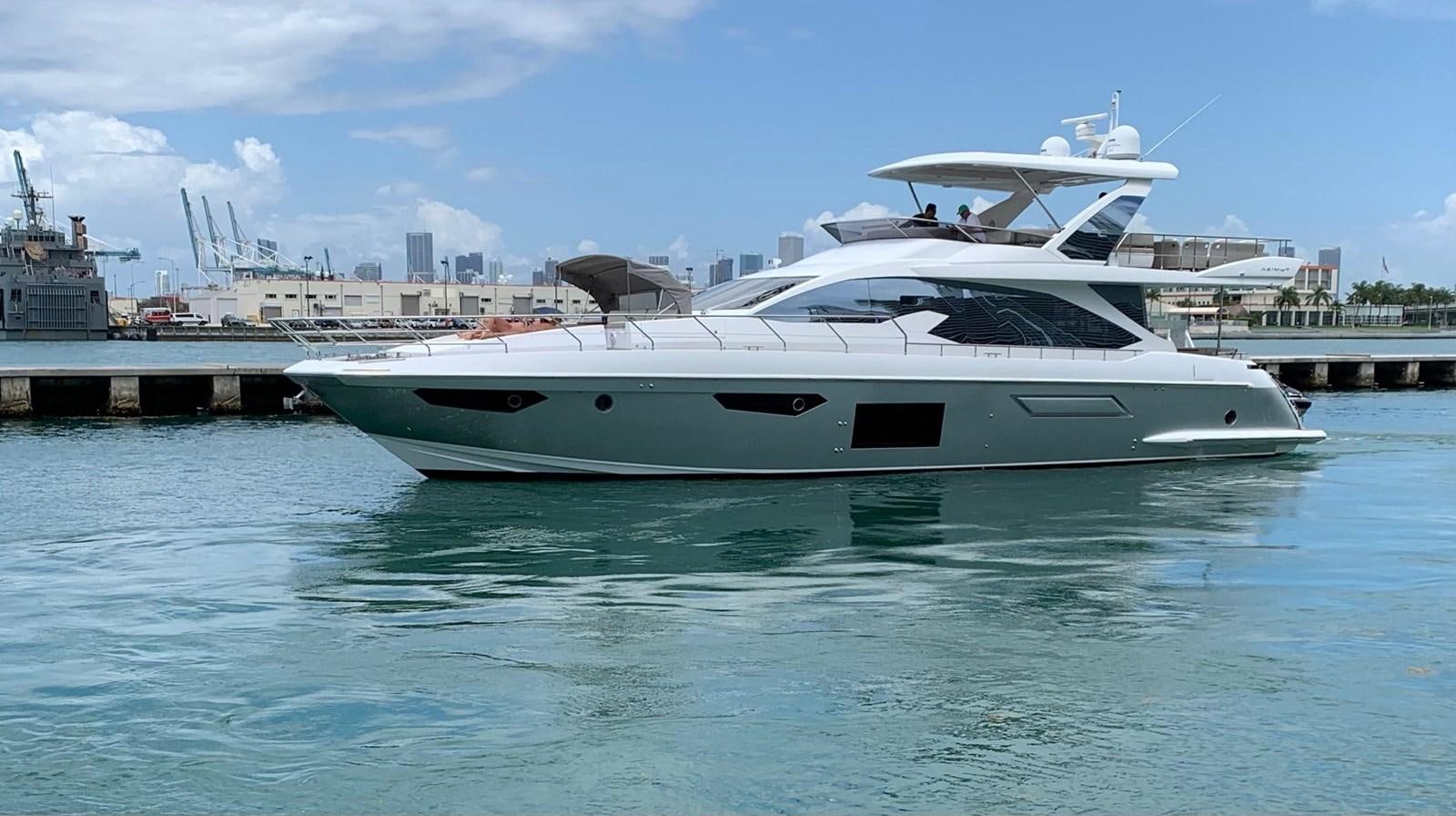 a white yacht in the water aboard AMALFI Yacht for Sale