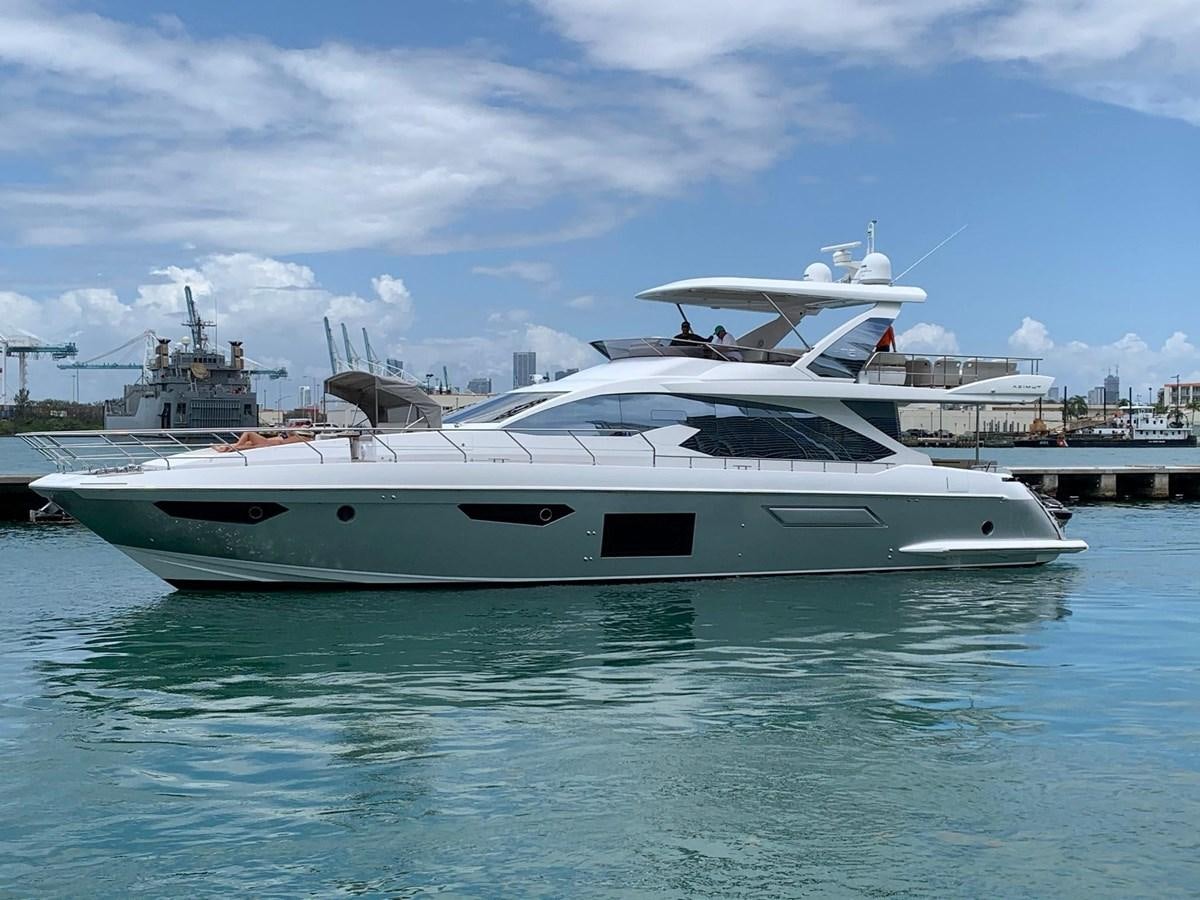 a white yacht in the water aboard AMALFI Yacht for Sale