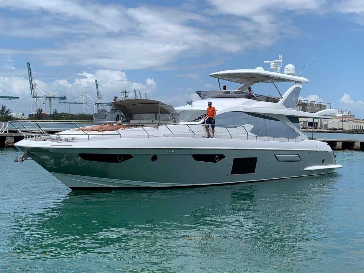 a person standing on a boat aboard AMALFI Yacht for Sale