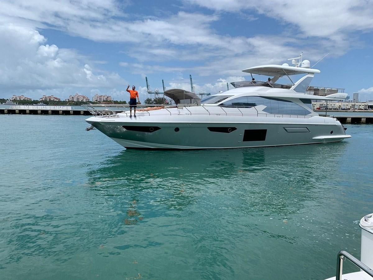 a white yacht in the water aboard AMALFI Yacht for Sale