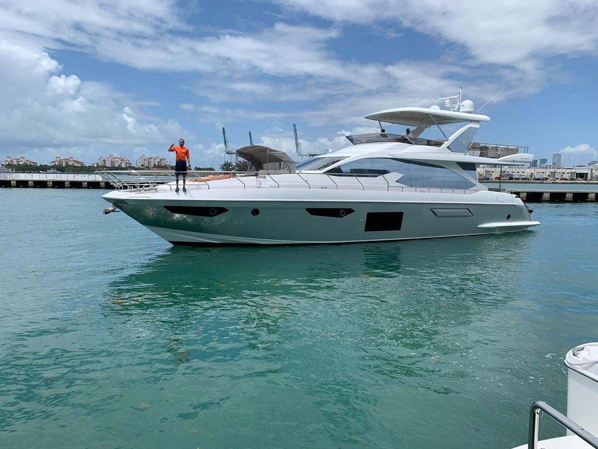 a person standing on a boat aboard AMALFI Yacht for Sale