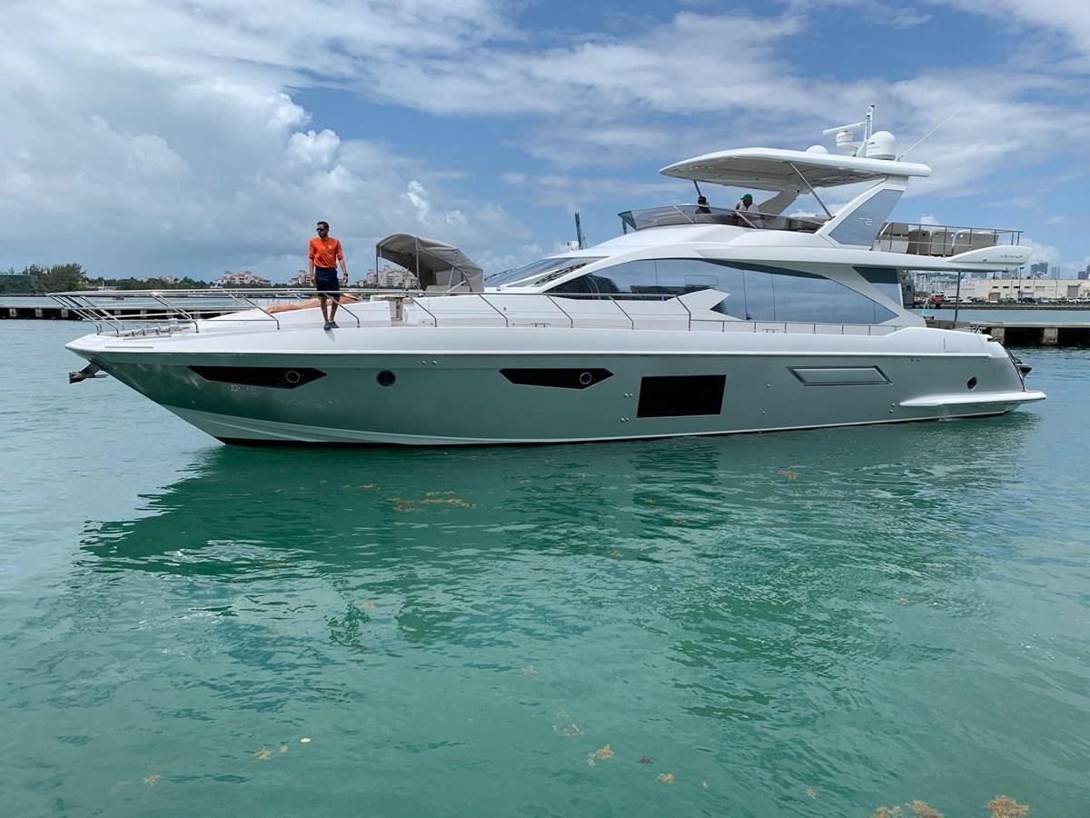 a person standing on a boat aboard AMALFI Yacht for Sale