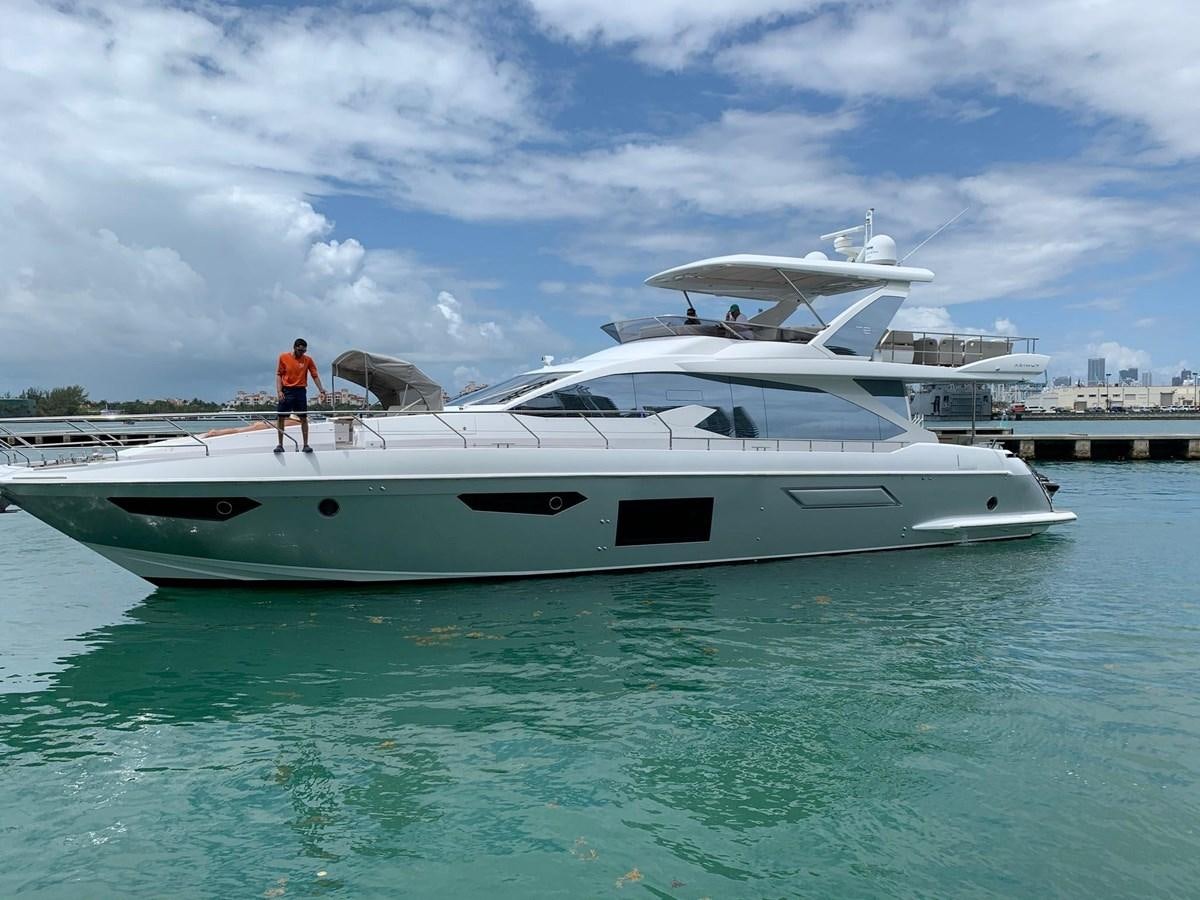 a person standing on a boat aboard AMALFI Yacht for Sale