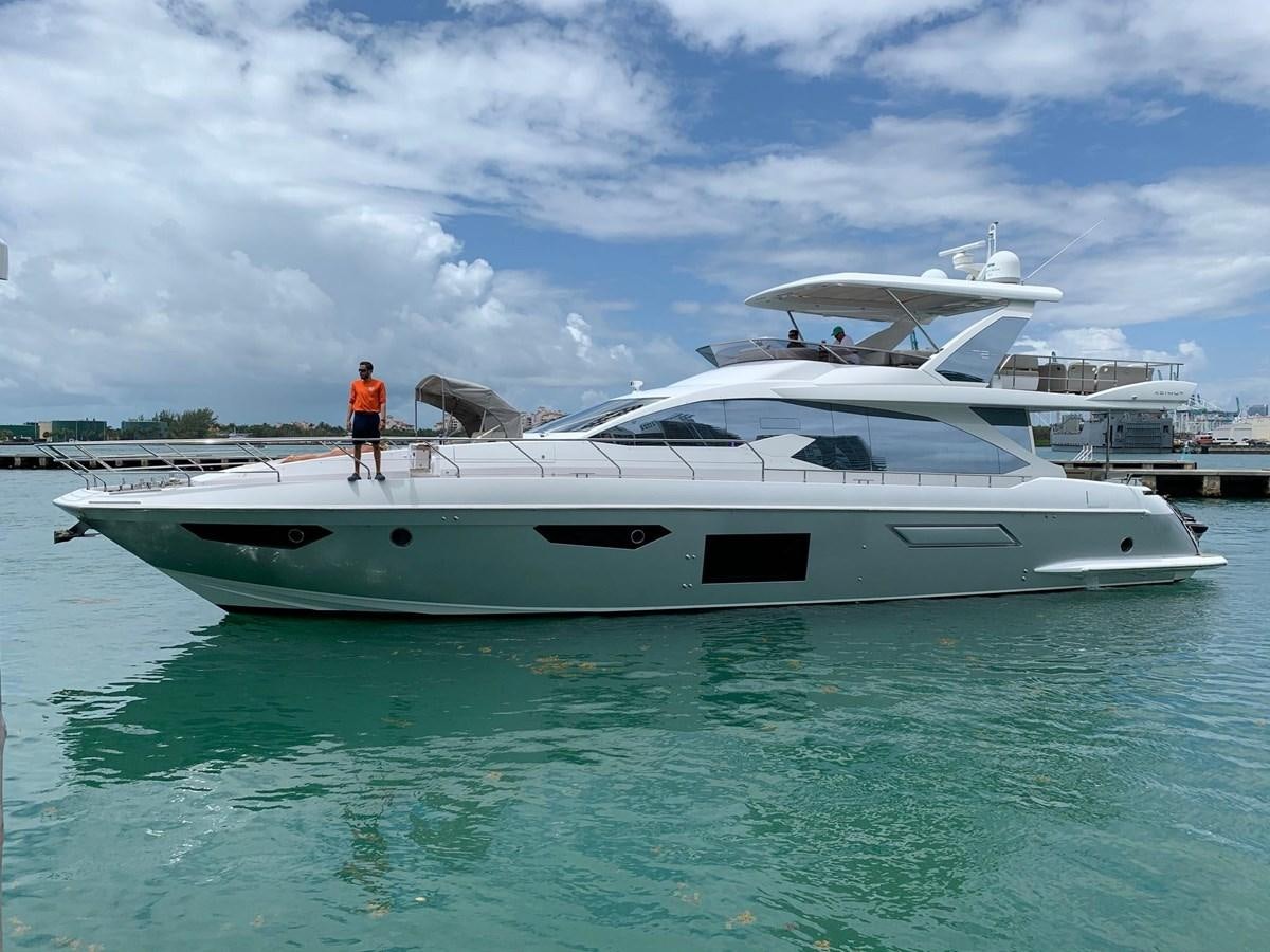 a person standing on a boat aboard AMALFI Yacht for Sale
