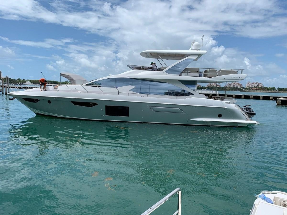 a white yacht in the water aboard AMALFI Yacht for Sale