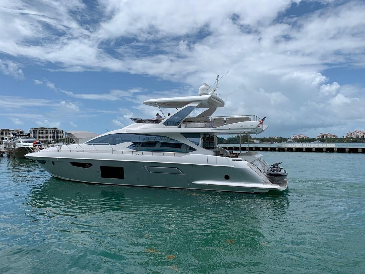 a white yacht in the water aboard AMALFI Yacht for Sale