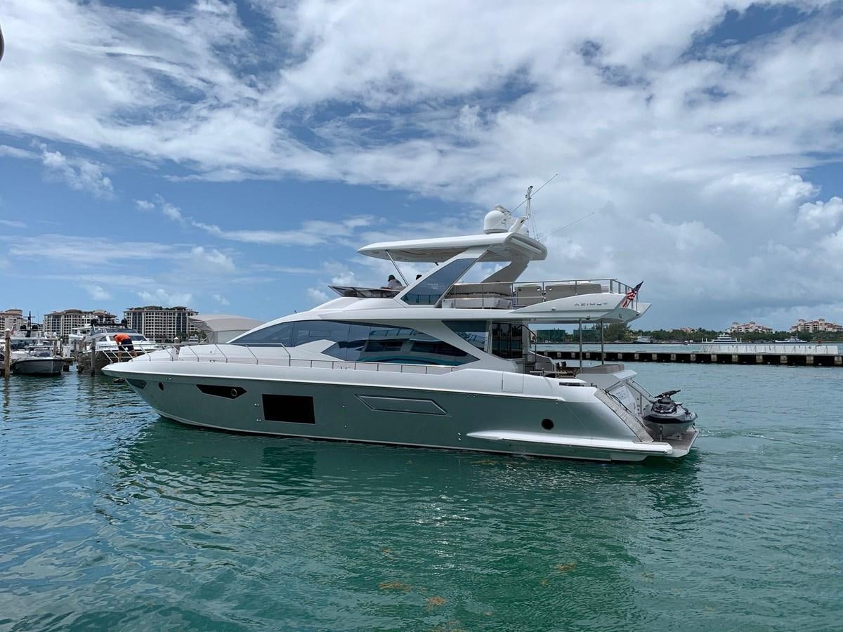 a white yacht in the water aboard AMALFI Yacht for Sale