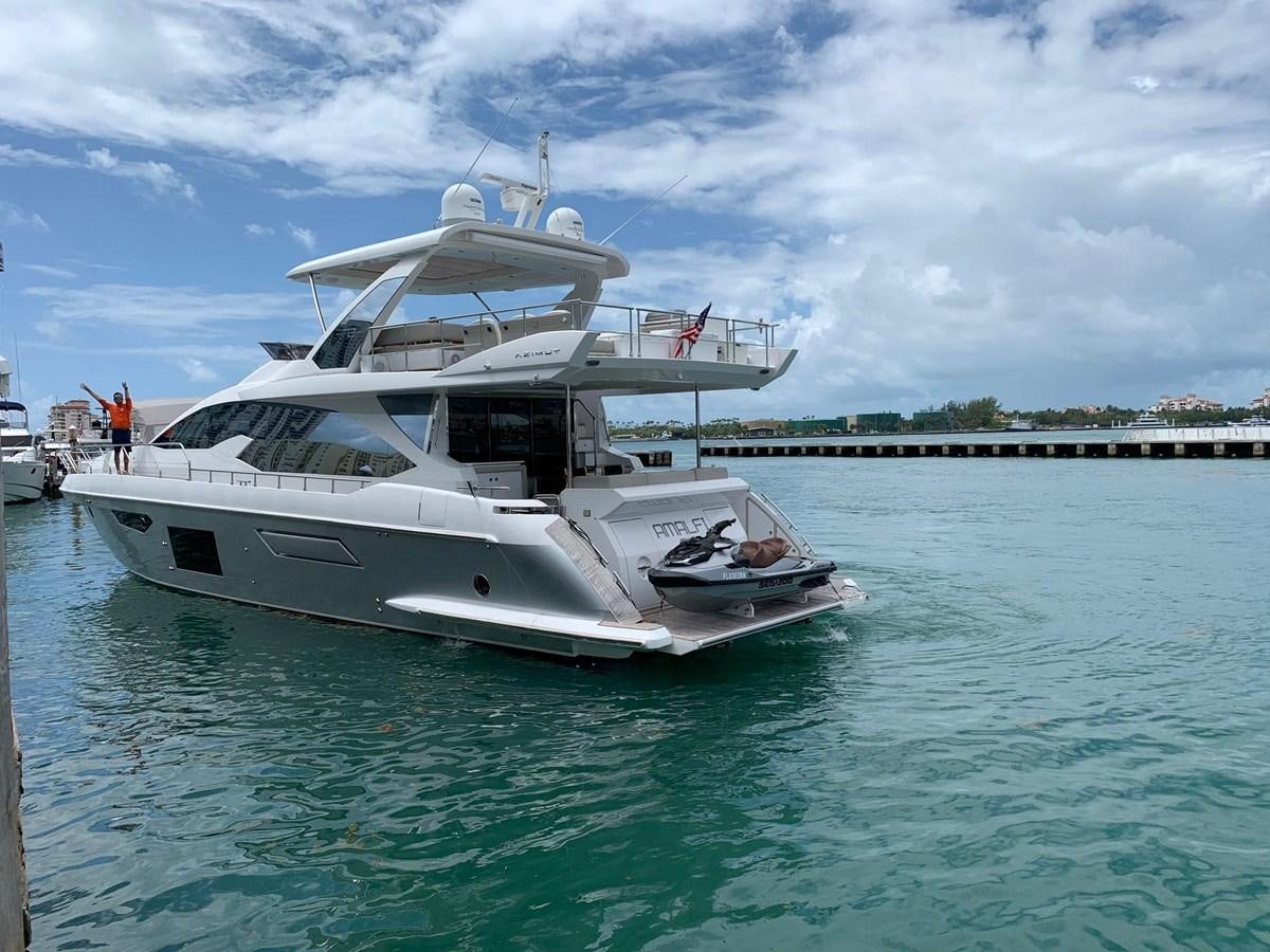 a white boat in the water aboard AMALFI Yacht for Sale
