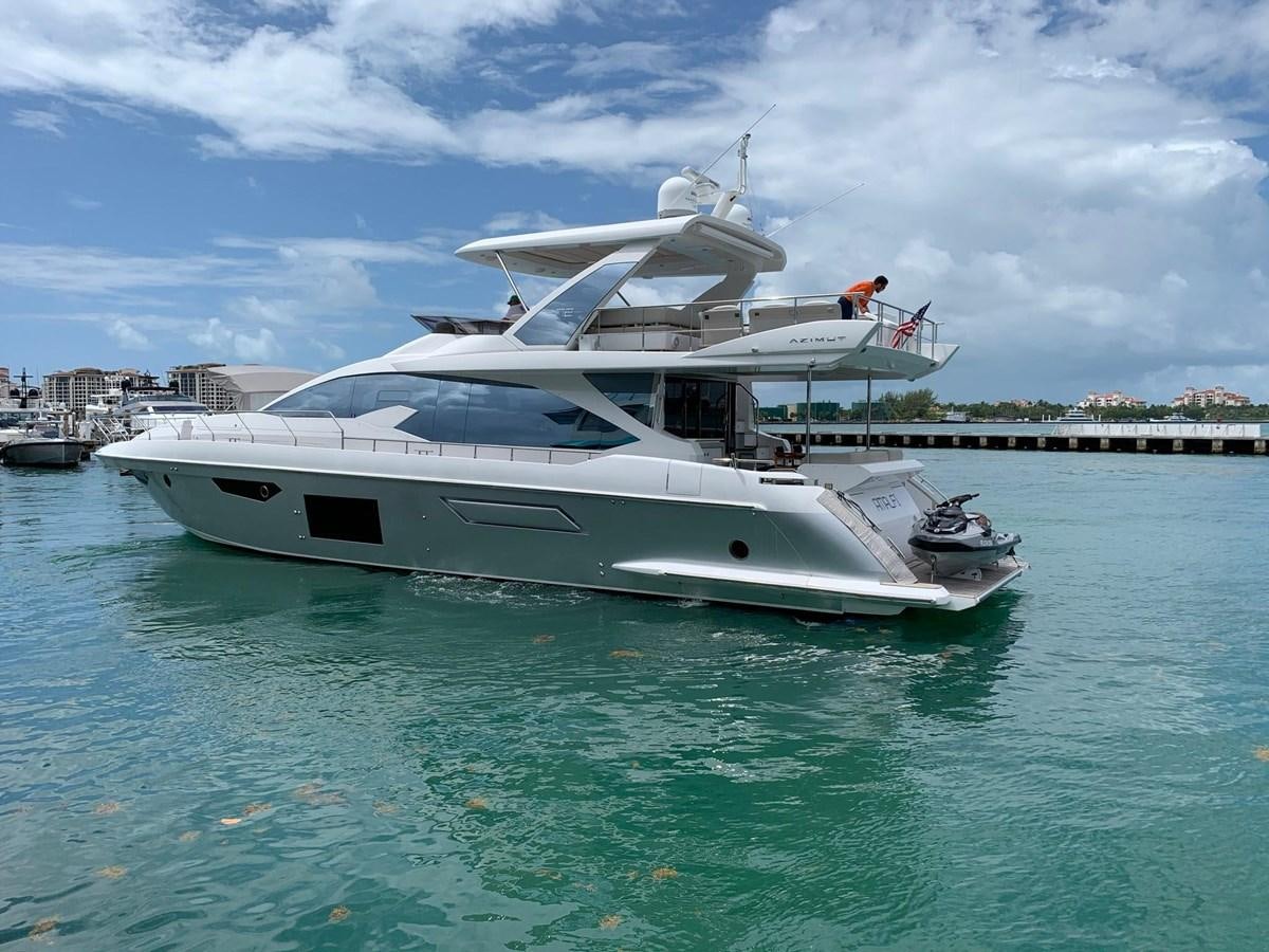 a white yacht in the water aboard AMALFI Yacht for Sale