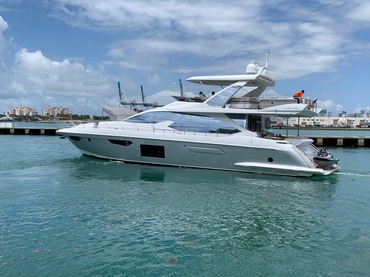 a white yacht in the water aboard AMALFI Yacht for Sale
