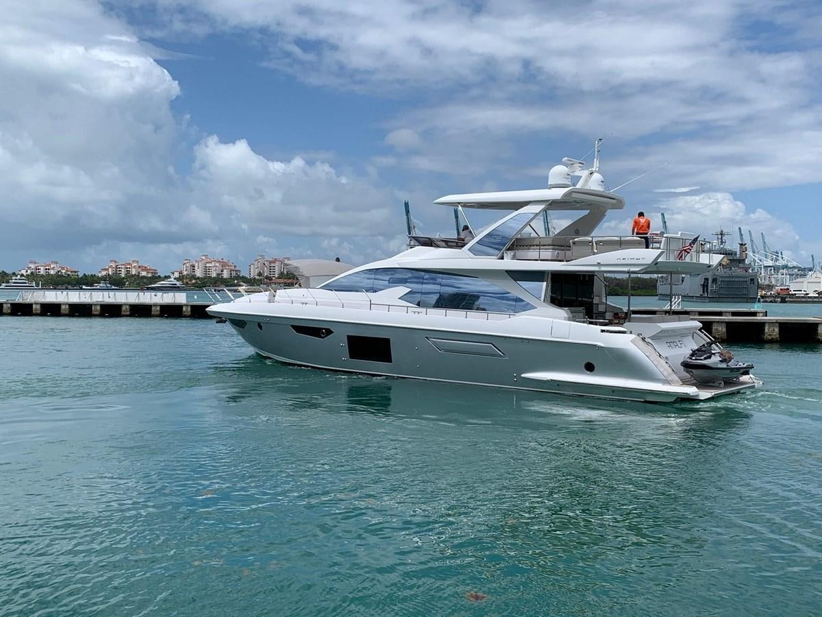 a white yacht in the water aboard AMALFI Yacht for Sale