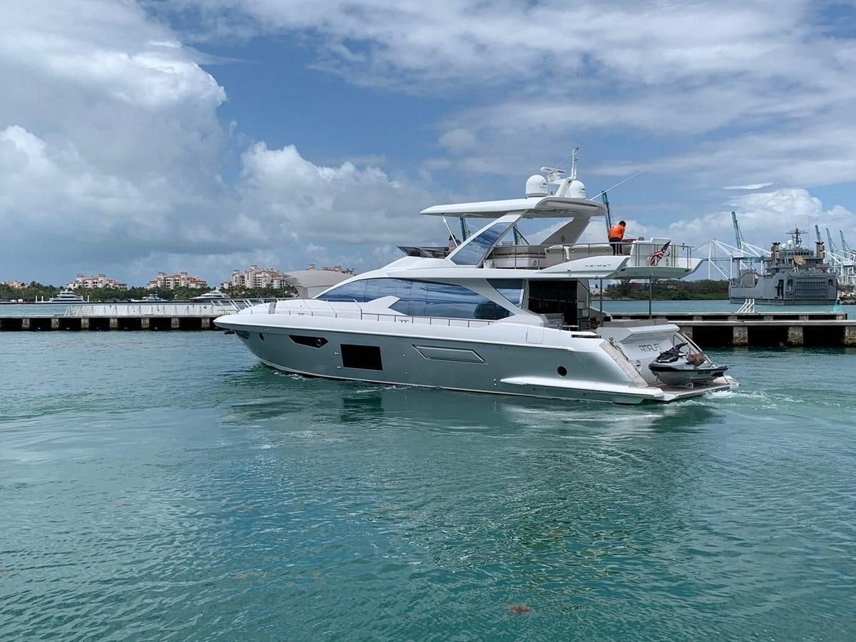 a white yacht in the water aboard AMALFI Yacht for Sale