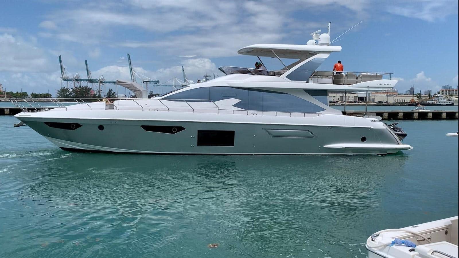 a white yacht in the water aboard AMALFI Yacht for Sale