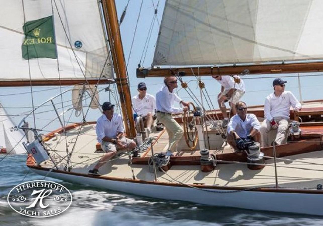 a group of people on a sailboat aboard RUGOSA Yacht for Sale