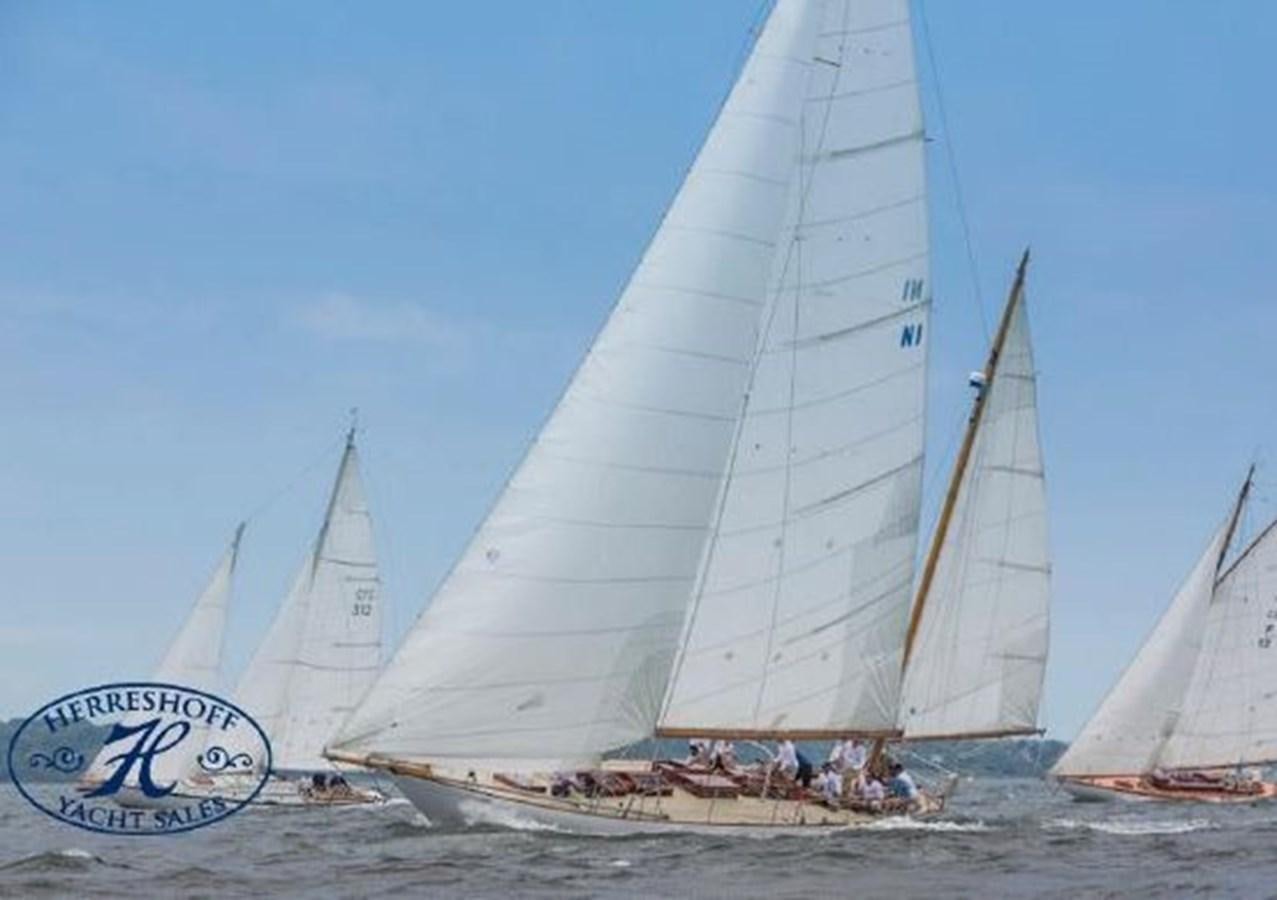a group of sailboats on the beach aboard RUGOSA Yacht for Sale