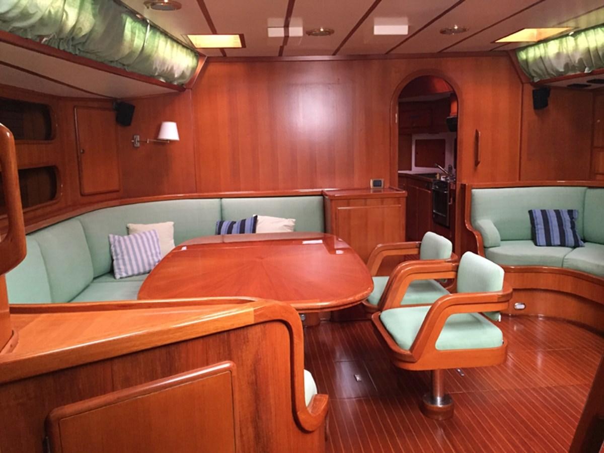 a room with couches and a table aboard MORGANA Yacht for Sale