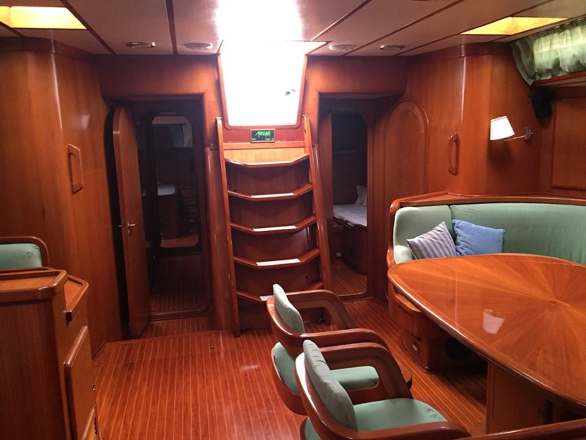 a cabin with a bed and a couch aboard MORGANA Yacht for Sale