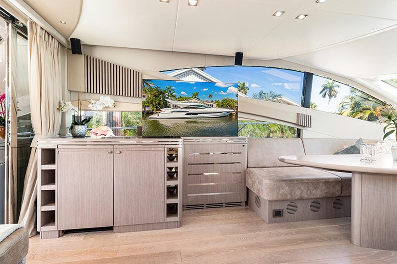 a room with a large painting aboard LONG WAY ROUND Yacht for Sale