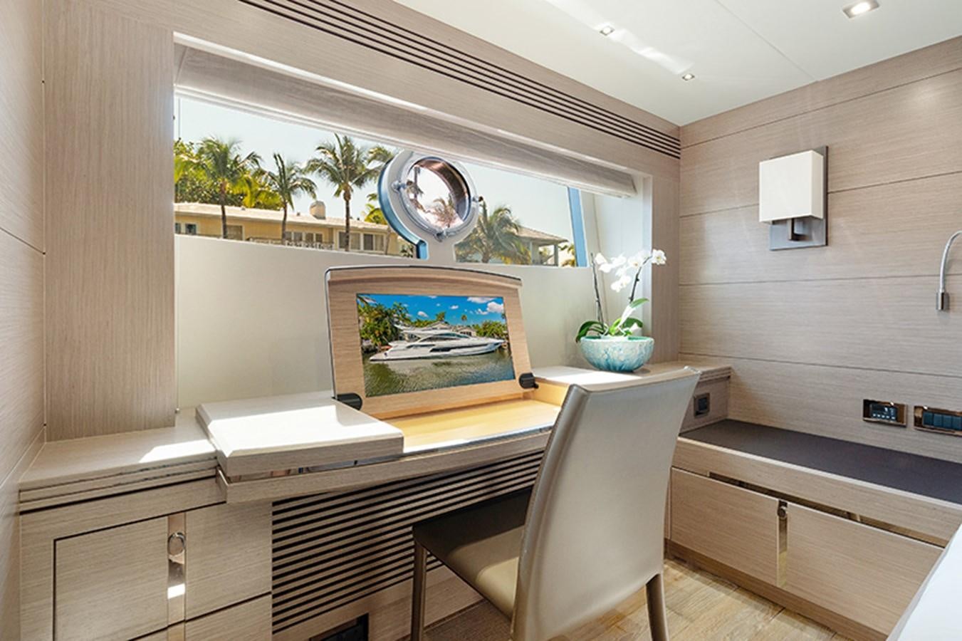 a room with a table and chairs aboard LONG WAY ROUND Yacht for Sale