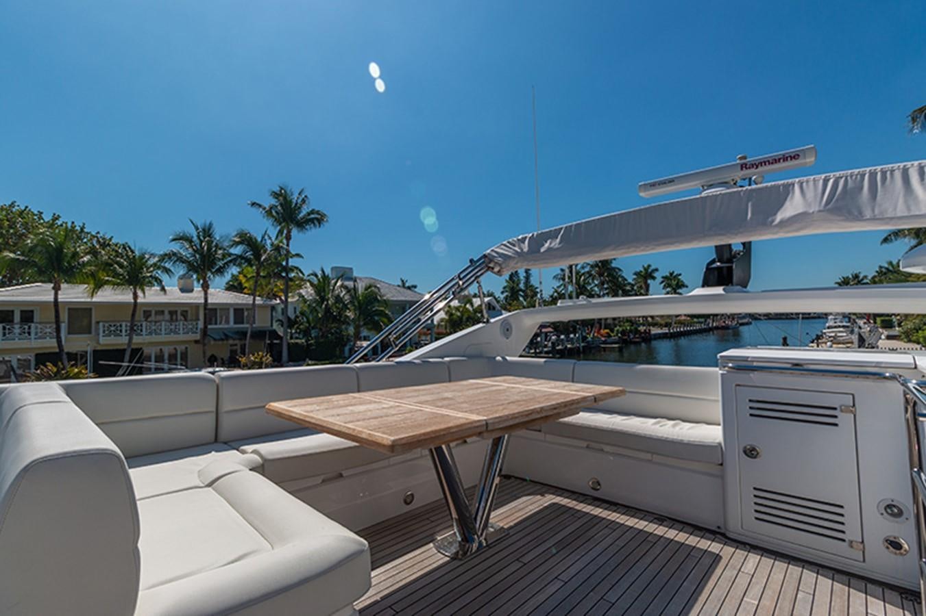a deck with a pool and a slide aboard LONG WAY ROUND Yacht for Sale