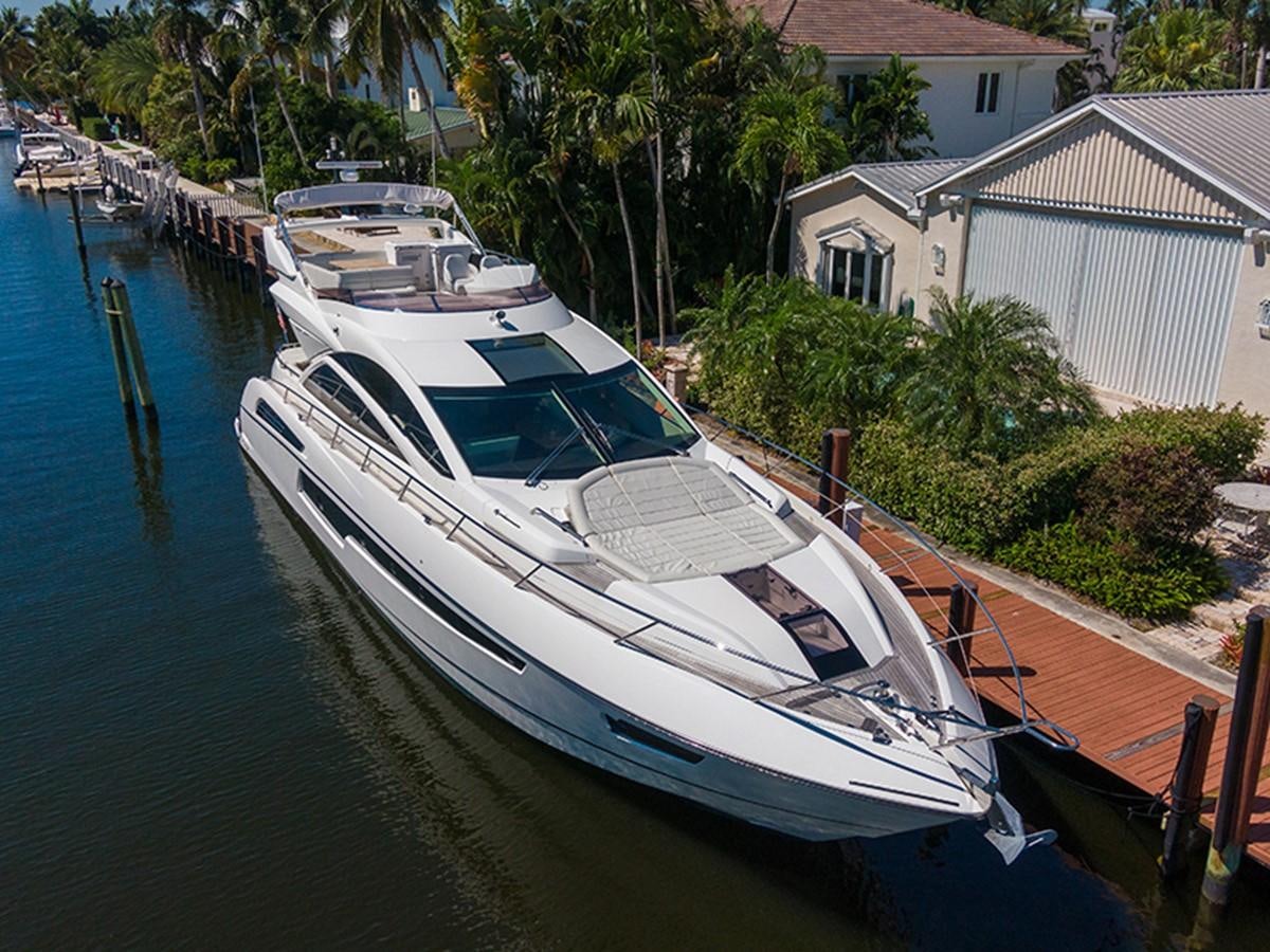 a boat docked at a pier aboard LONG WAY ROUND Yacht for Sale