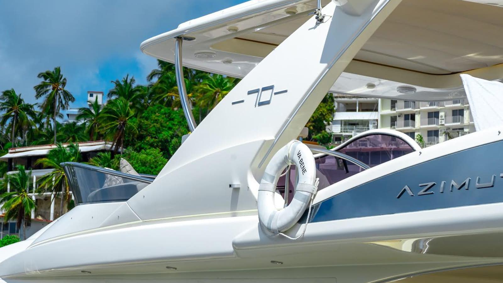 a plane parked in front of a building aboard VA BENE 2011 AZIMUT 70 FLY Yacht for Sale