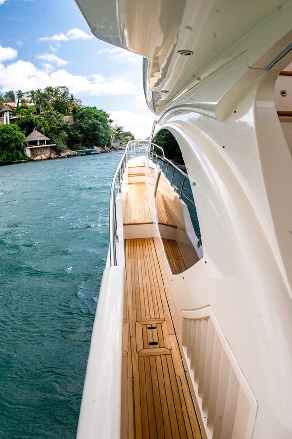 a boat on the water aboard VA BENE 2011 AZIMUT 70 FLY Yacht for Sale