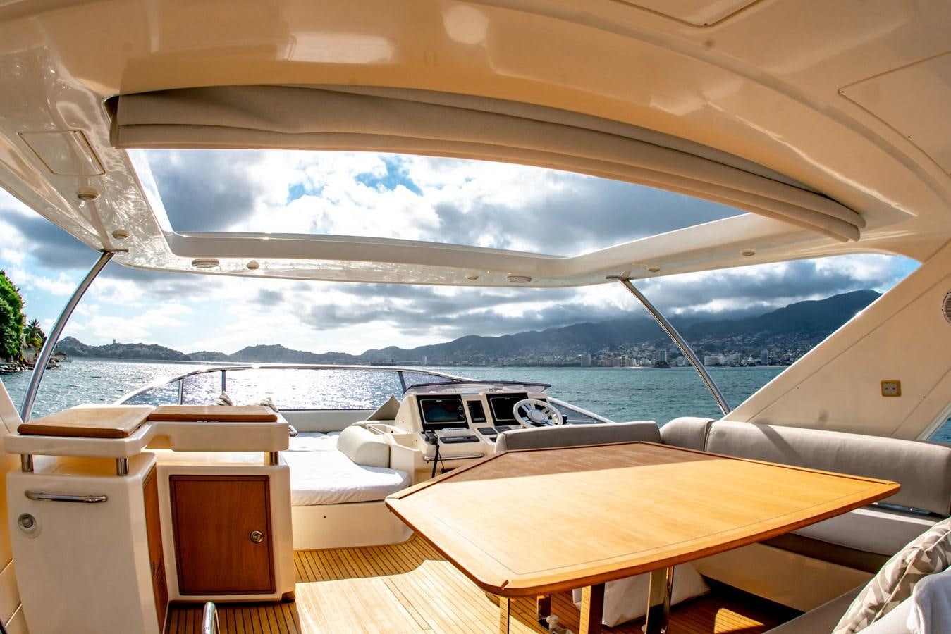 a boat on the water aboard VA BENE 2011 AZIMUT 70 FLY Yacht for Sale