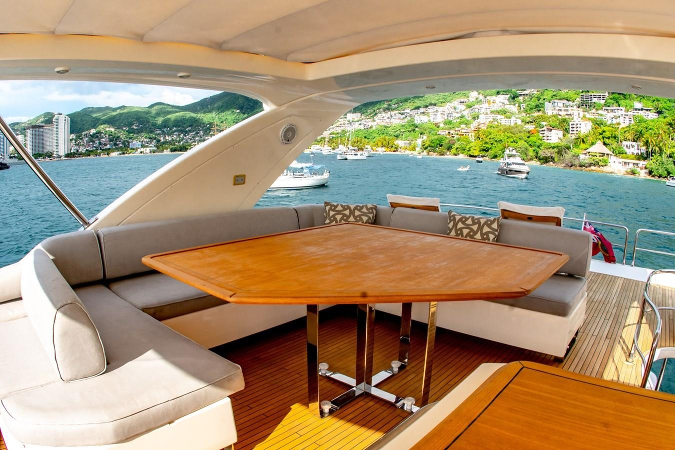 a table on a boat aboard VA BENE 2011 AZIMUT 70 FLY Yacht for Sale