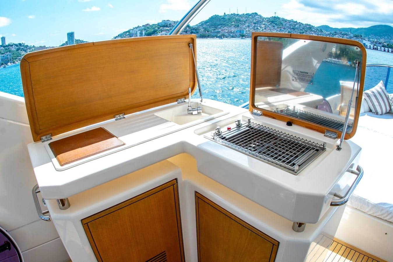 a boat with a laptop on it aboard VA BENE 2011 AZIMUT 70 FLY Yacht for Sale