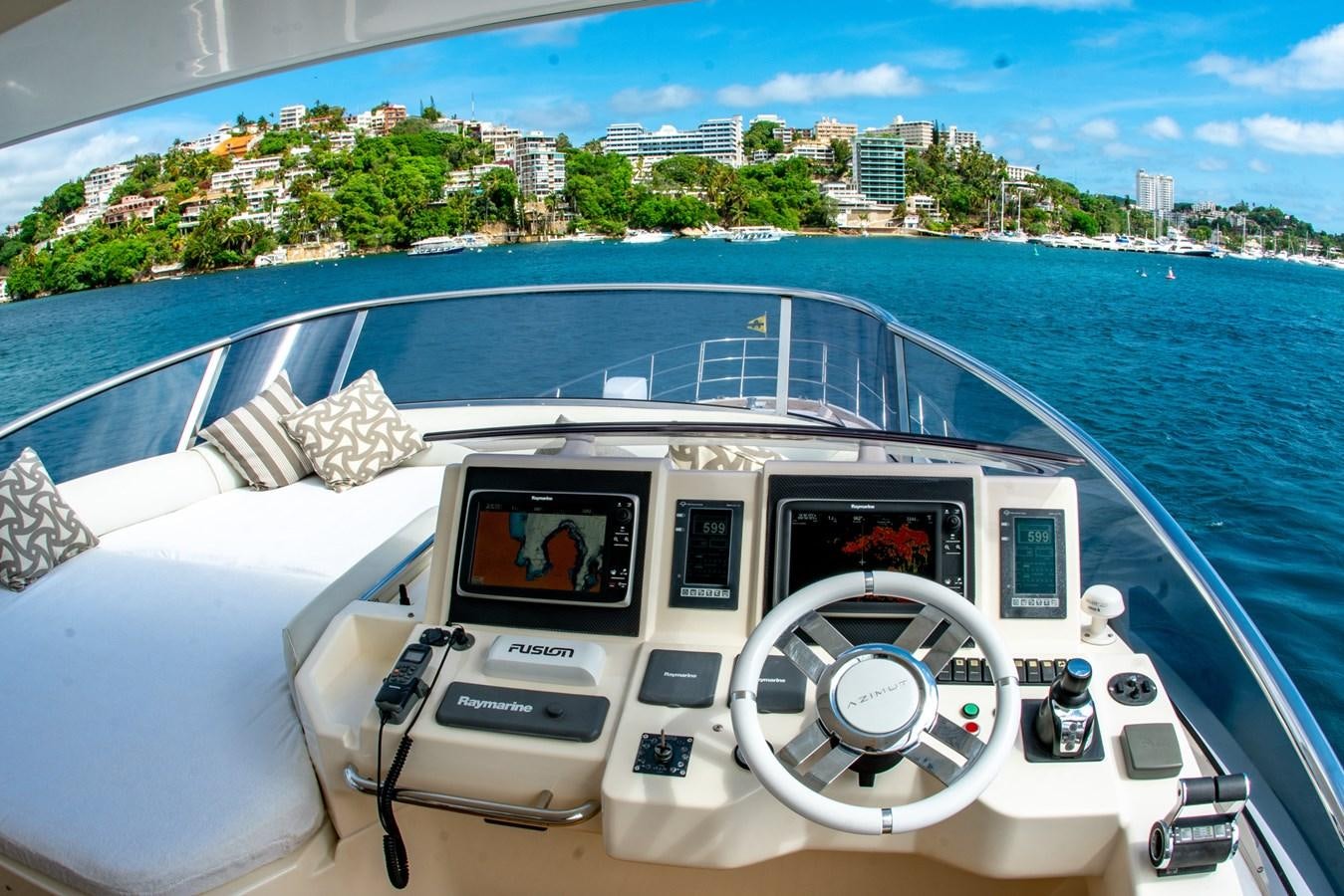 a boat with a large body of water and a land in the background aboard VA BENE 2011 AZIMUT 70 FLY Yacht for Sale