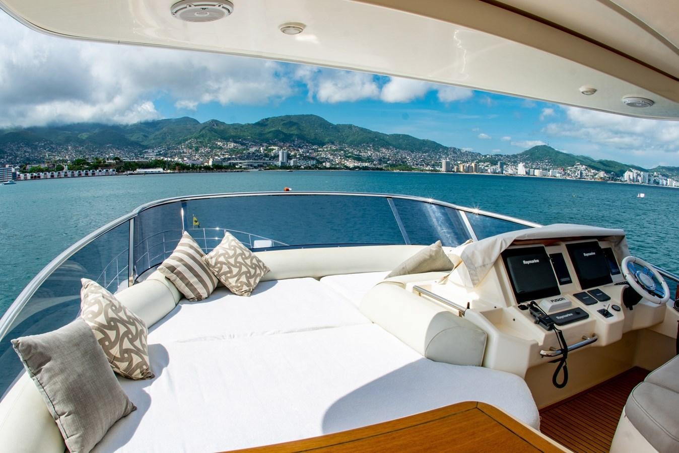 a boat on the water aboard VA BENE 2011 AZIMUT 70 FLY Yacht for Sale