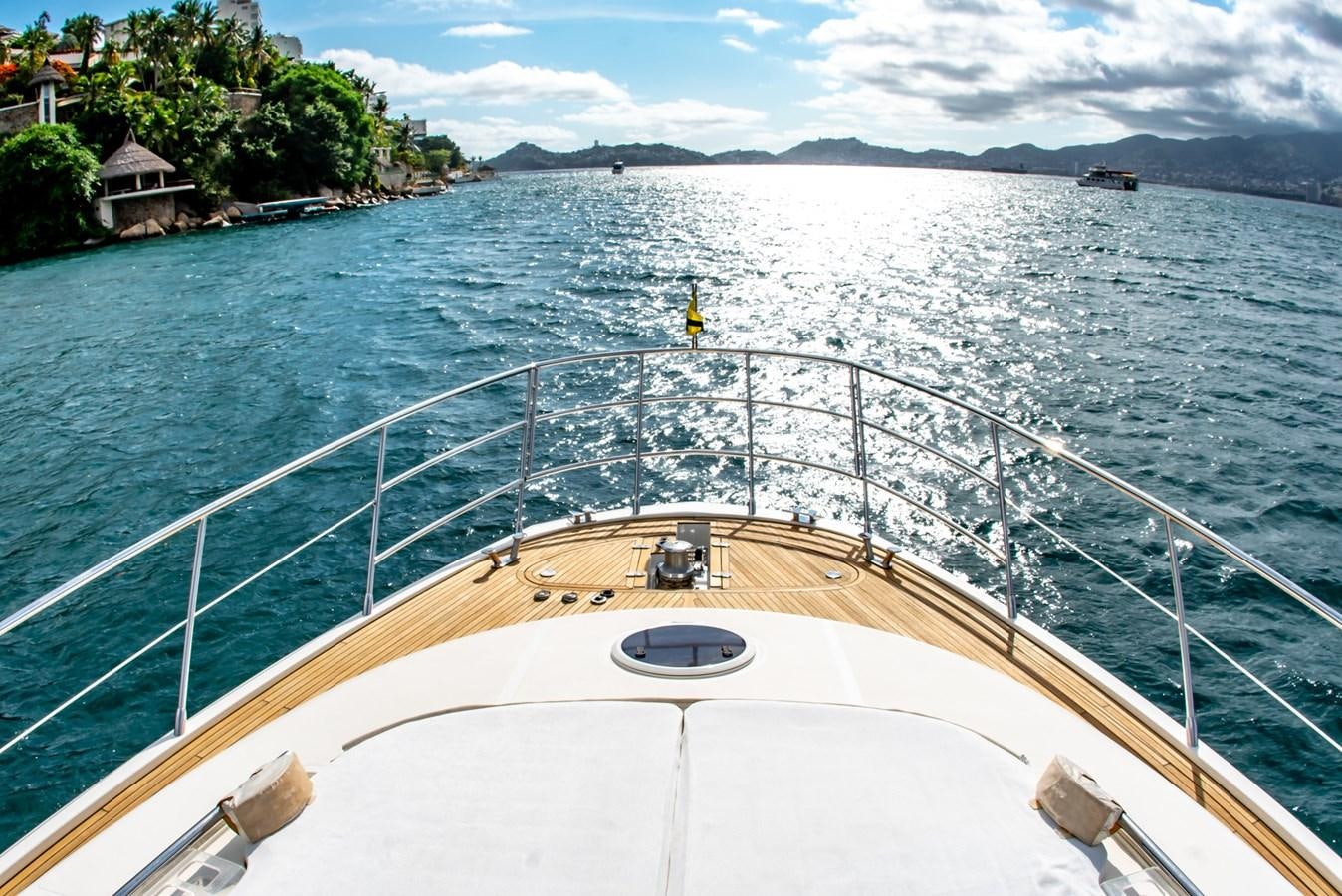 a boat on the water aboard VA BENE 2011 AZIMUT 70 FLY Yacht for Sale