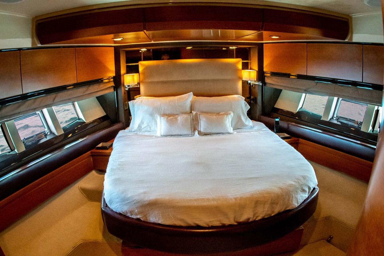 a bed in a room aboard VA BENE 2011 AZIMUT 70 FLY Yacht for Sale