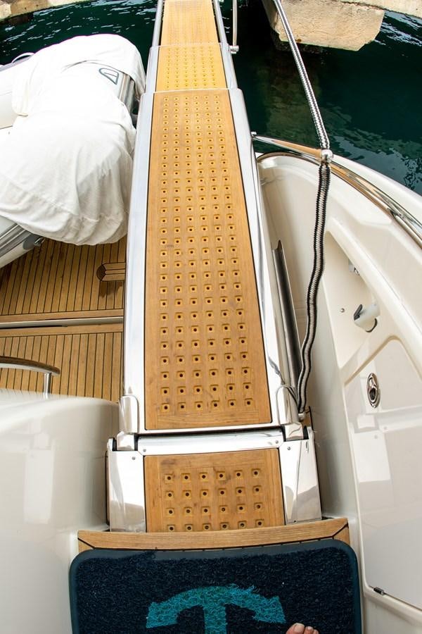 a wooden box on a stand aboard VA BENE 2011 AZIMUT 70 FLY Yacht for Sale