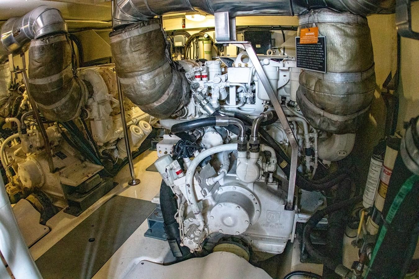 a machine with a large piece of equipment in it aboard VA BENE 2011 AZIMUT 70 FLY Yacht for Sale