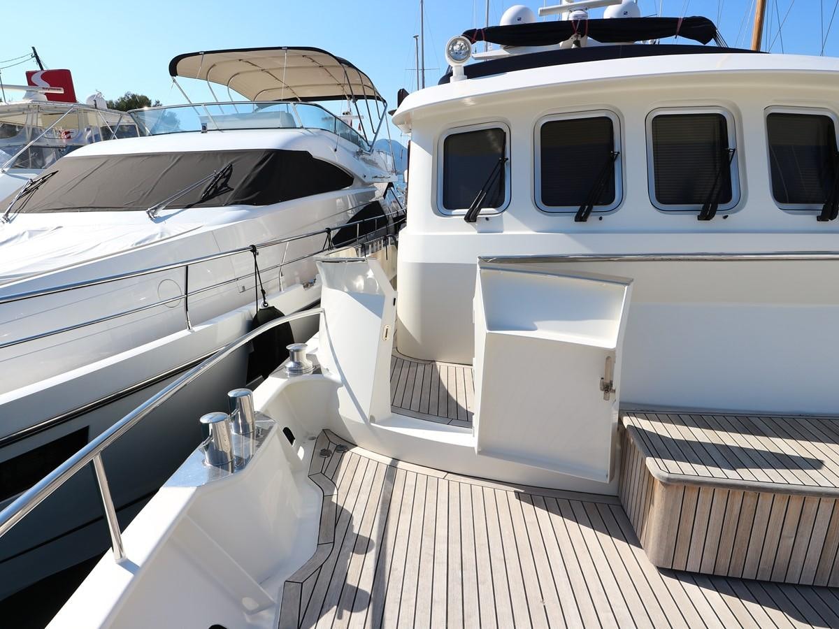 a boat docked at a pier aboard Polar Princess Yacht for Sale