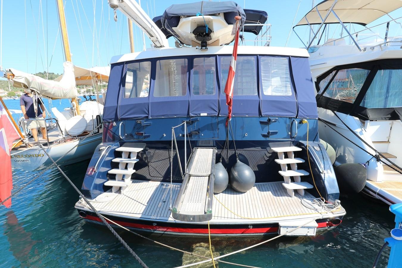 a boat docked at a pier aboard Polar Princess Yacht for Sale